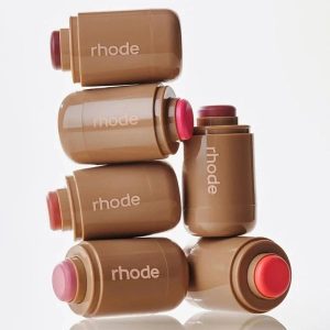Rhode blushes.